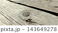 Weathered Wooden Plank Texture with Wood Knot and Metal Fastener 143649278