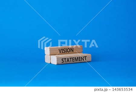 VISION STATEMENT symbol. Concept word VISION STATEMENT on wooden blocks. Beautiful blue background. Business and VISION STATEMENT concept. Copy space 143653534