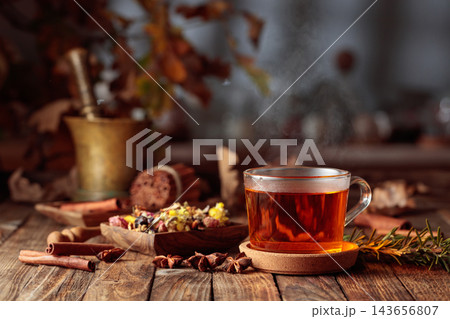 Herbal tea with cinnamon, anise, and dried herbs. 143656807