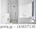 Modern empty bathroom interior mockup with white bathtub, glass shower cabin, and toilet. 143657136