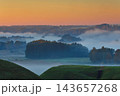 Fields covered in fog in Kernave, Lithuania 143657268
