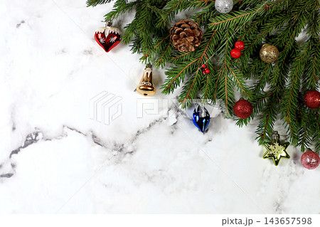 Festive winter greeting card and banner on the screen, Beautiful Christmas and New Year background with lights, decorations, toys and live fir branches, product design for holiday advertising, Festive winter greeting card and banner on the screen, Beautiful Christmas and New Year background with lights, decorations, toys and live fir branches, product design for holiday advertising, 143657598