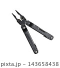 Black folding multitool with needle nose pliers, ruler markings and integrated tools isolated on a clean white background 143658438