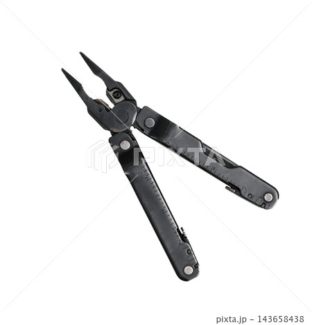 Black folding multitool with needle nose pliers, ruler markings and integrated tools isolated on a clean white background 143658438
