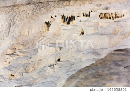 Natural travertine pools and terraces in Pamukkale Natural travertine pools and terraces in Pamukkale 143658891