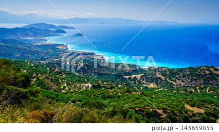 Mirabello Bay coastline with hills and olive groves, Crete, Greece Mirabello Bay coastline with hills and olive groves, Crete, Greece 143659855