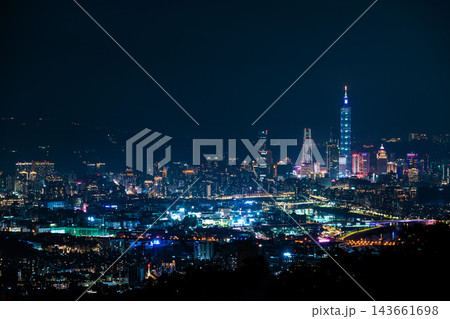 Taipei city skyline aerial view at night with Taipei 101 and illuminated skyscrapers in Taiwan Taipei city skyline aerial view at night with Taipei 101 and illuminated skyscrapers in Taiwan 143661698