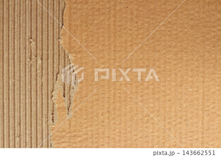 Brown cardboard sheet abstract background, texture of recycle paper box in old vintage pattern with ripped edges. 143662551