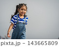 preschool child girl walking on a road on mountain in morning 143665809