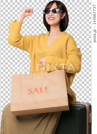Cheerful asian woman holding sale shopping bag near suitcase generated with artificial intelligence concepts for travel retail experience Cheerful asian woman holding sale shopping bag near suitcase generated with artificial intelligence concepts for travel retail experience 143667737
