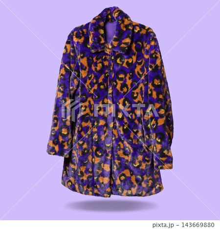Purple leopard print faux fur coat hovering on purple background front view Purple leopard print faux fur coat hovering on purple background front view 143669880