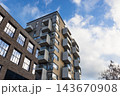 Apartment building with concrete balconies 143670908