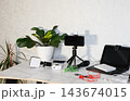 Interior of studio with photographer's workplace, drawers and folding screen 143674015