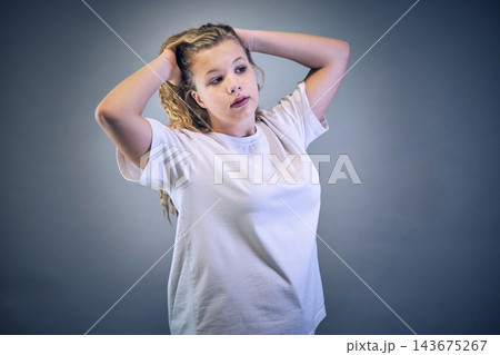 Studio portrait of a girl in casual clothing Studio portrait of a girl in casual clothing 143675267