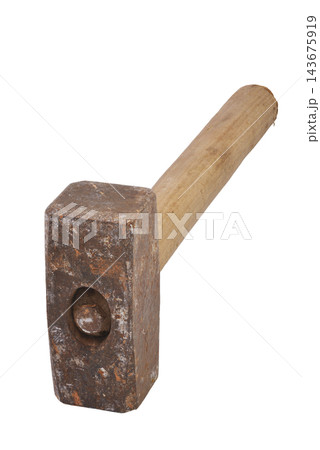 A rusted sledgehammer with a wooden handle A rusted sledgehammer with a wooden handle 143675919