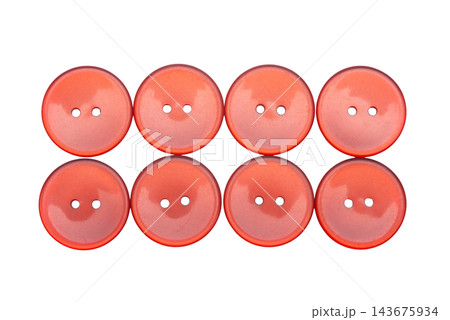 Eight shiny orange buttons with two holes Eight shiny orange buttons with two holes 143675934