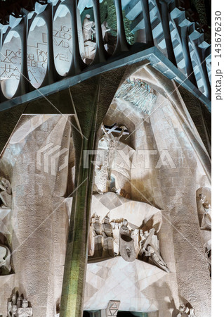 Crucifixion sculpture detail on the Passion facade of Sagrada Familia at night Crucifixion sculpture detail on the Passion facade of Sagrada Familia at night 143676230