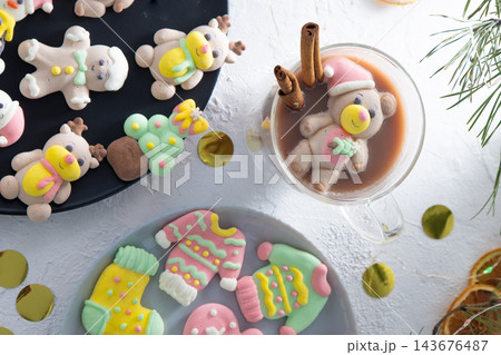 Christmas marshmallows. Winter candy. Sweet food in December. Christmas marshmallows. Winter candy. Sweet food in December. 143676487