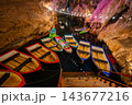 Tham Nang Ene Cave Boats and Colorful Lighting Tham Nang Ene Cave Boats and Colorful Lighting 143677216