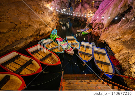 Tham Nang Ene Cave Boats and Colorful Lighting 143677216