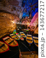 Rowboats are available for tourists who wish to explore the deeper inside of the cave Rowboats are available for tourists who wish to explore the deeper inside of the cave 143677217