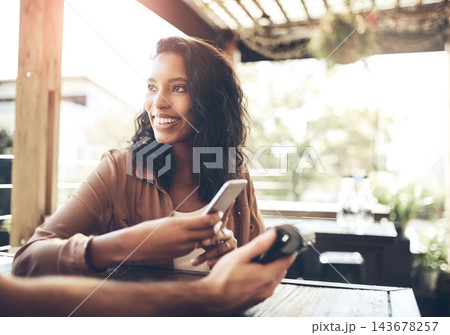 Woman, smartphone and pos terminal in coffee shop for paying by customer for waitress service. Finance, bill and nfc with person paperless payment using wireless technology in cafe or restaurant Woman, smartphone and pos terminal in coffee shop for paying by customer for waitress service. Finance, bill and nfc with person paperless payment using wireless technology in cafe or restaurant 143678257