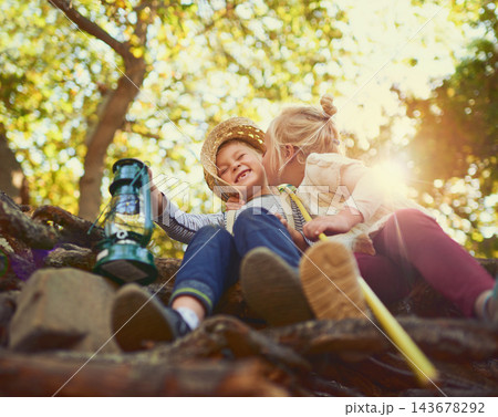 Friends, boy and girl with kiss, outdoor and children in countryside, smile and happiness in vacation. Forest, lantern and laughing with love, relax and playful in nature, rocks and youth in summer Friends, boy and girl with kiss, outdoor and children in countryside, smile and happiness in vacation. Forest, lantern and laughing with love, relax and playful in nature, rocks and youth in summer 143678292