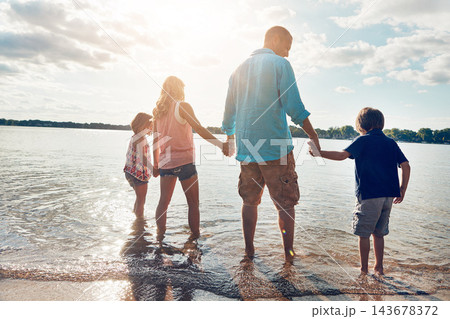 Family, water and vacation in beach, holding hands and travel for summer, holiday and nature of California. Parents, kids and adventure in tropical, sea and man with woman, together and children Family, water and vacation in beach, holding hands and travel for summer, holiday and nature of California. Parents, kids and adventure in tropical, sea and man with woman, together and children 143678372