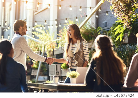 Business people, greeting and handshake in meeting at cafe for welcome, b2b networking or remote work outdoor. Group, employees and shaking hands for onboarding, partnership or laughing for agreement Business people, greeting and handshake in meeting at cafe for welcome, b2b networking or remote work outdoor. Group, employees and shaking hands for onboarding, partnership or laughing for agreement 143678424