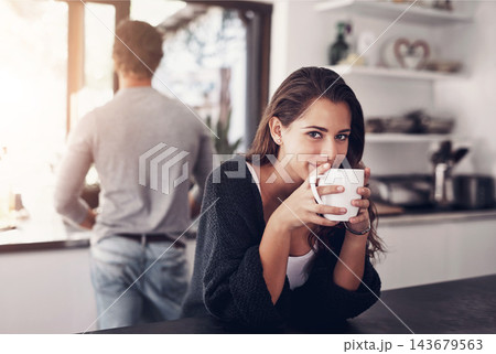 Coffee, portrait and woman with boyfriend in kitchen at home in morning on weekend together. Smile, love and female person drinking latte, cappuccino or caffeine for relax at apartment in Canada. Coffee, portrait and woman with boyfriend in kitchen at home in morning on weekend together. Smile, love and female person drinking latte, cappuccino or caffeine for relax at apartment in Canada. 143679563