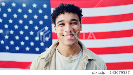 Man, portrait and american flag for independence, smile and heritage in background. Male model, stars and stripes for patriotism in USA, freedom or representation in celebration for human rights 143679587