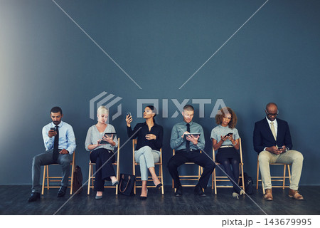Business people, hiring and waiting in line with technology for recruitment process and employment opportunity. Diverse group, job seeker and sitting in row for HR meeting with mockup space or banner Business people, hiring and waiting in line with technology for recruitment process and employment opportunity. Diverse group, job seeker and sitting in row for HR meeting with mockup space or banner 143679995