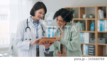 Hospital, tablet and doctor with woman for consulting, medical service and help in clinic. Healthcare, telehealth and person with patient on digital tech for diagnosis, online results and insurance Hospital, tablet and doctor with woman for consulting, medical service and help in clinic. Healthcare, telehealth and person with patient on digital tech for diagnosis, online results and insurance 143680769