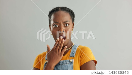 Shocked, portrait and black woman in studio with omg for announcement, gossip or fake news on gray background. Wtf, mockup and person with hand covering mouth for secret, wow or unexpected revelation Shocked, portrait and black woman in studio with omg for announcement, gossip or fake news on gray background. Wtf, mockup and person with hand covering mouth for secret, wow or unexpected revelation 143680846