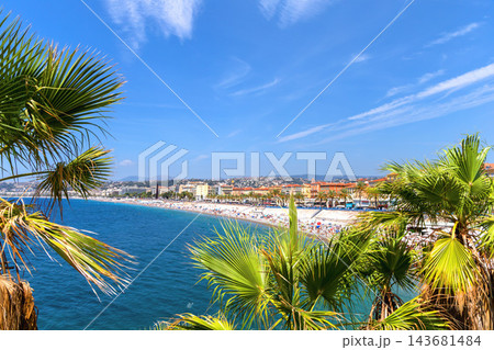 Sunny Nice coastline with colorful buildings and beach. Nice, France Sunny Nice coastline with colorful buildings and beach. Nice, France 143681484