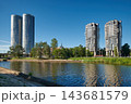Modern Zunda Towers skyscrapers and Philosophers Residence buildings from the riverbank in Riga, Latvia. 143681579