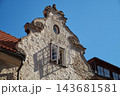 Gable of the historic Swedish Gate building in Old Riga, Latvia. Vintage open window on a sunny day. 143681581