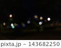 Defocused street lights, warm bokeh circles at night 143682250