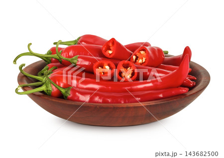 red hot chili pepper in wooden bowl isolated on white background 143682500