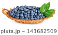blueberry in wicker basket isolated on white background 143682509