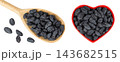 black raisins in wooden spoon isolated on white background. Top view. Flat lay 143682515