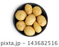 young potato in a ceramic bowl isolated on white background. Harvest new. Top view. Flat lay. 143682516