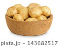 young potato in a wooden bowl isolated on white background. Harvest new 143682517