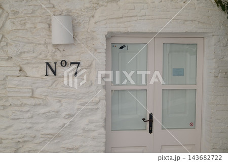 Architectural Door with Distinctive Design, Color and Decorative Details 143682722
