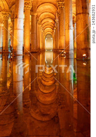 Istanbul,turkey,august 6, 2025. Ancient subterranean structure featuring rows of illuminated roman columns reflected on shallow water, creating an ethereal and historical atmosphere 143682931