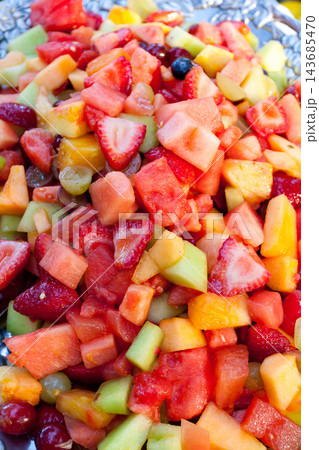 Fresh Colorful Fruit Salad Close-Up with Tropical Summer Mix Fresh Colorful Fruit Salad Close-Up with Tropical Summer Mix 143685470