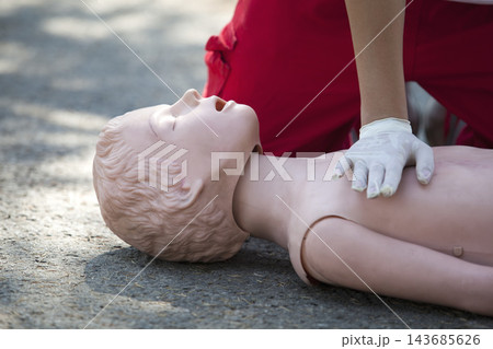 CPR Training Mannequin for Outdoor First Aid Practice 143685626