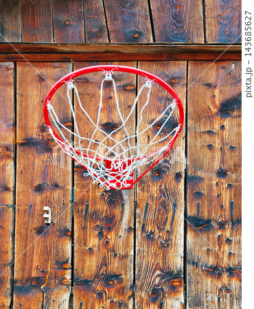 Basketball Hoop on Rustic Wooden Wall 143685627