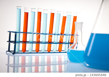 Laboratory Test Tubes with Colorful Chemical Solutions 143685846