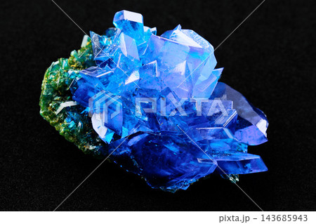Blue Crystal Mineral Cluster Macro on Black Background 143685943